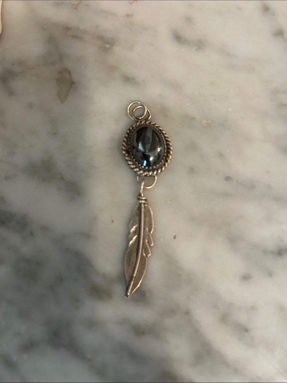 Sterling Silver Feather Pendant with Black Hematite Stone Signed piece.